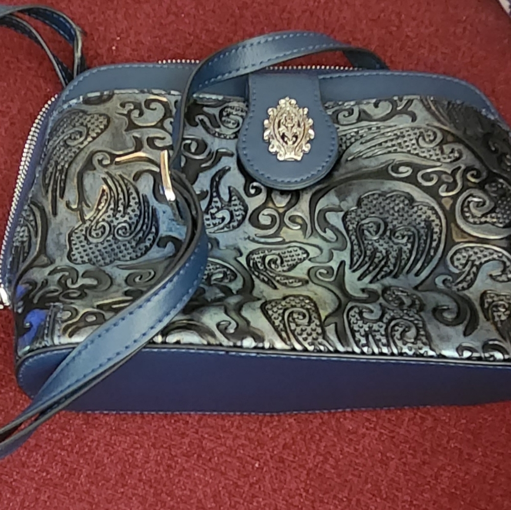 M.C. Marc Chantel Domed, tooled leather crossbody purse